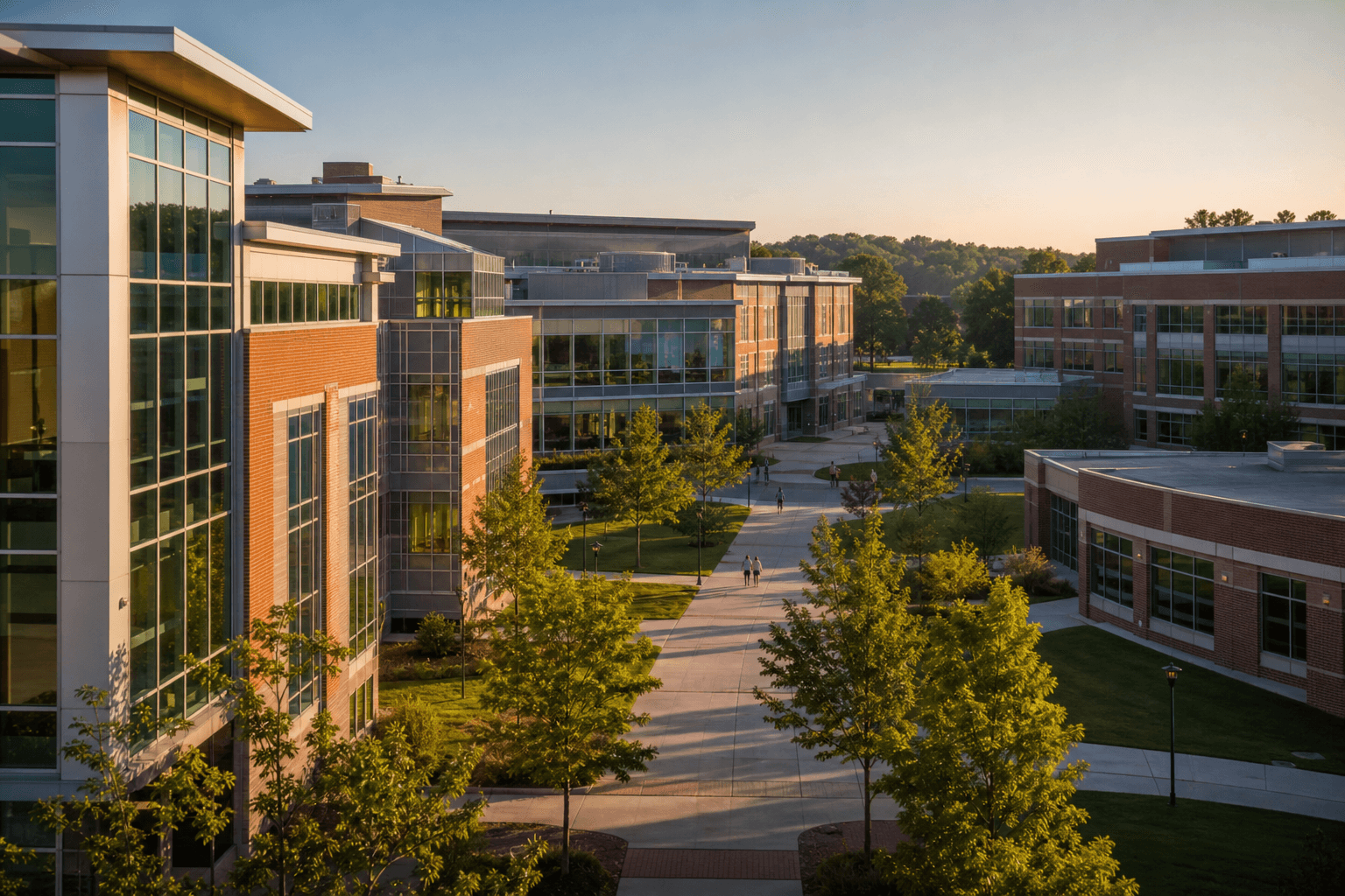 A multi-building school campus in late afternoon light